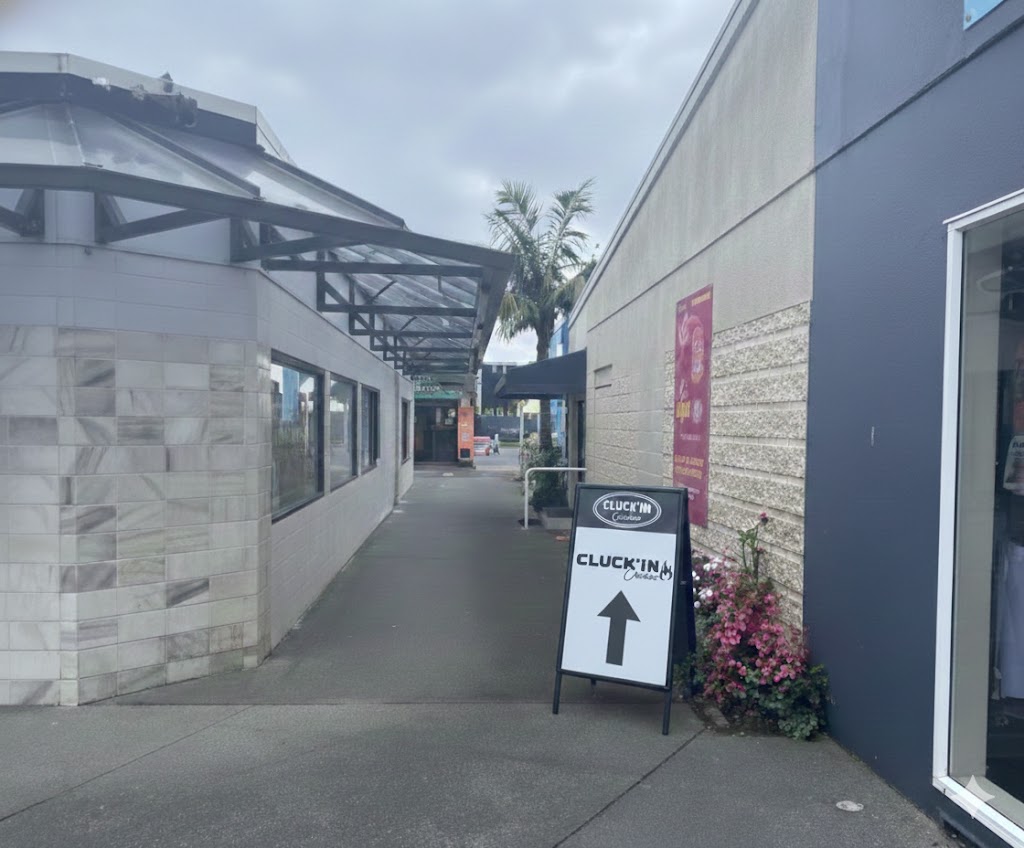 Cluck'in Chicken Storefront Sign